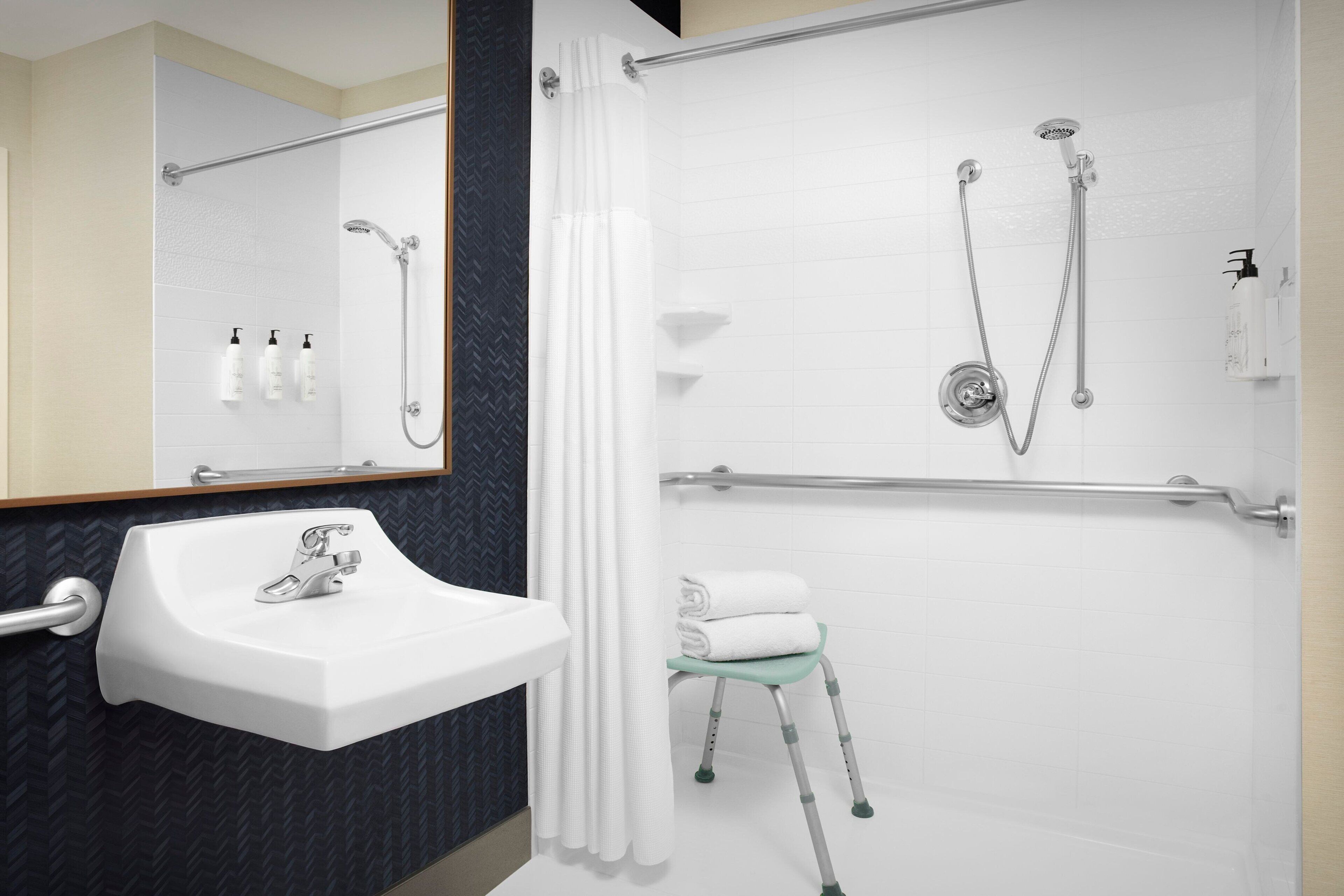 room, 2 queen beds | bathroom | free toiletries, hair dryer, towels, soap