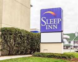 Placa de Sleep Inn com um design moderno e simples.