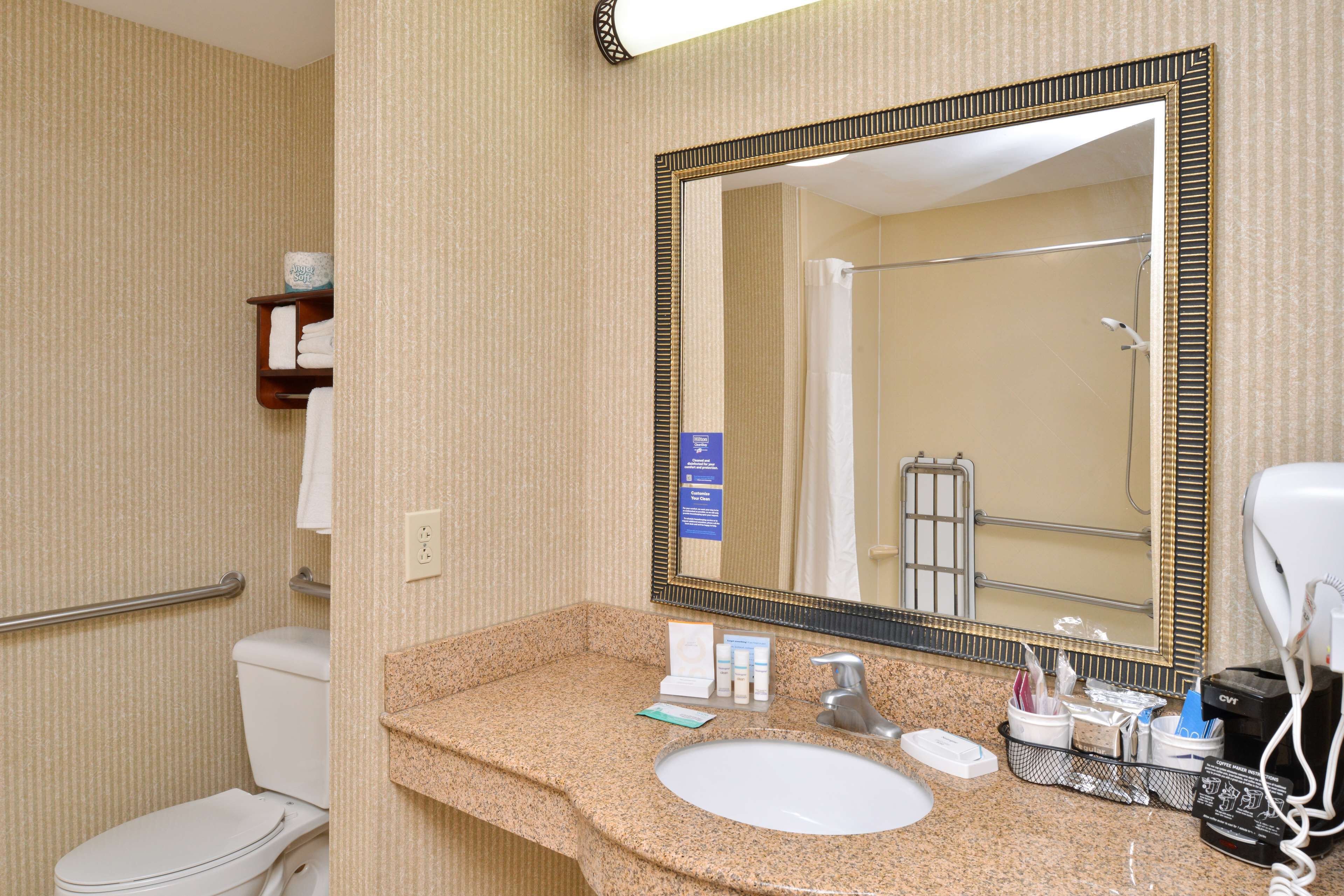 one king bed, non-smoking | bathroom | combined shower/bathtub, free toiletries, towels
