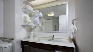 Combined shower/tub, designer toiletries, hair dryer, towels