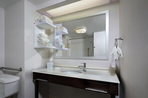 Combined shower/tub, designer toiletries, hair dryer, towels