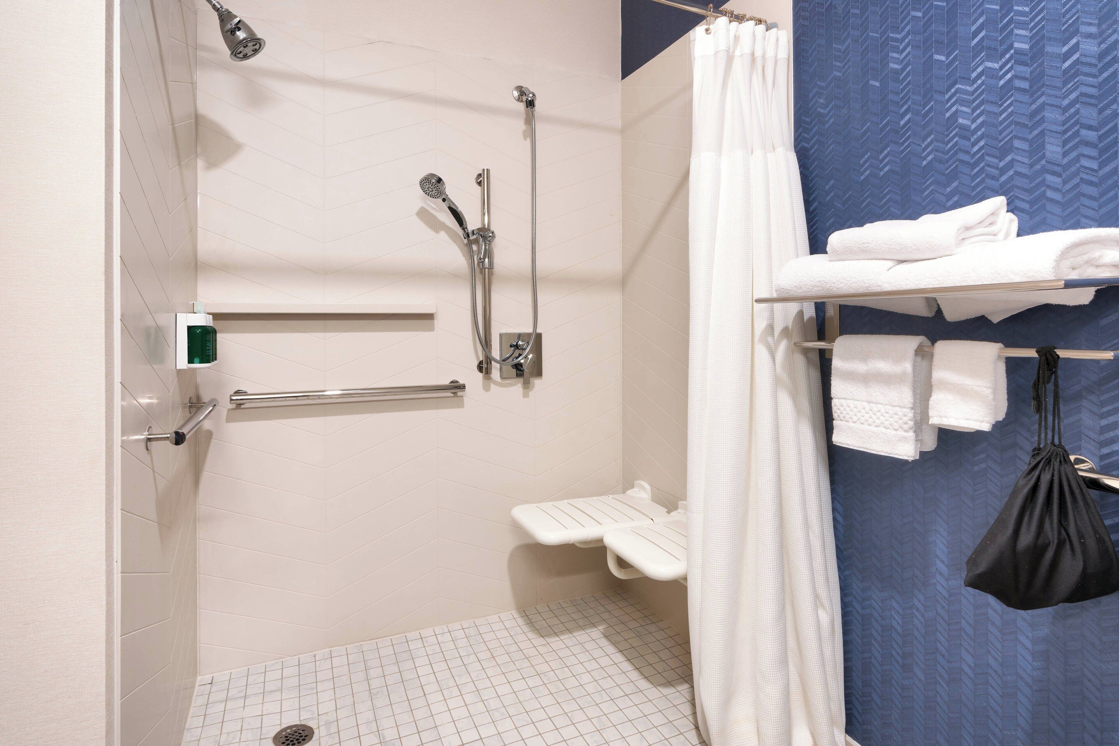 combined shower/bathtub, free toiletries, hair dryer, towels