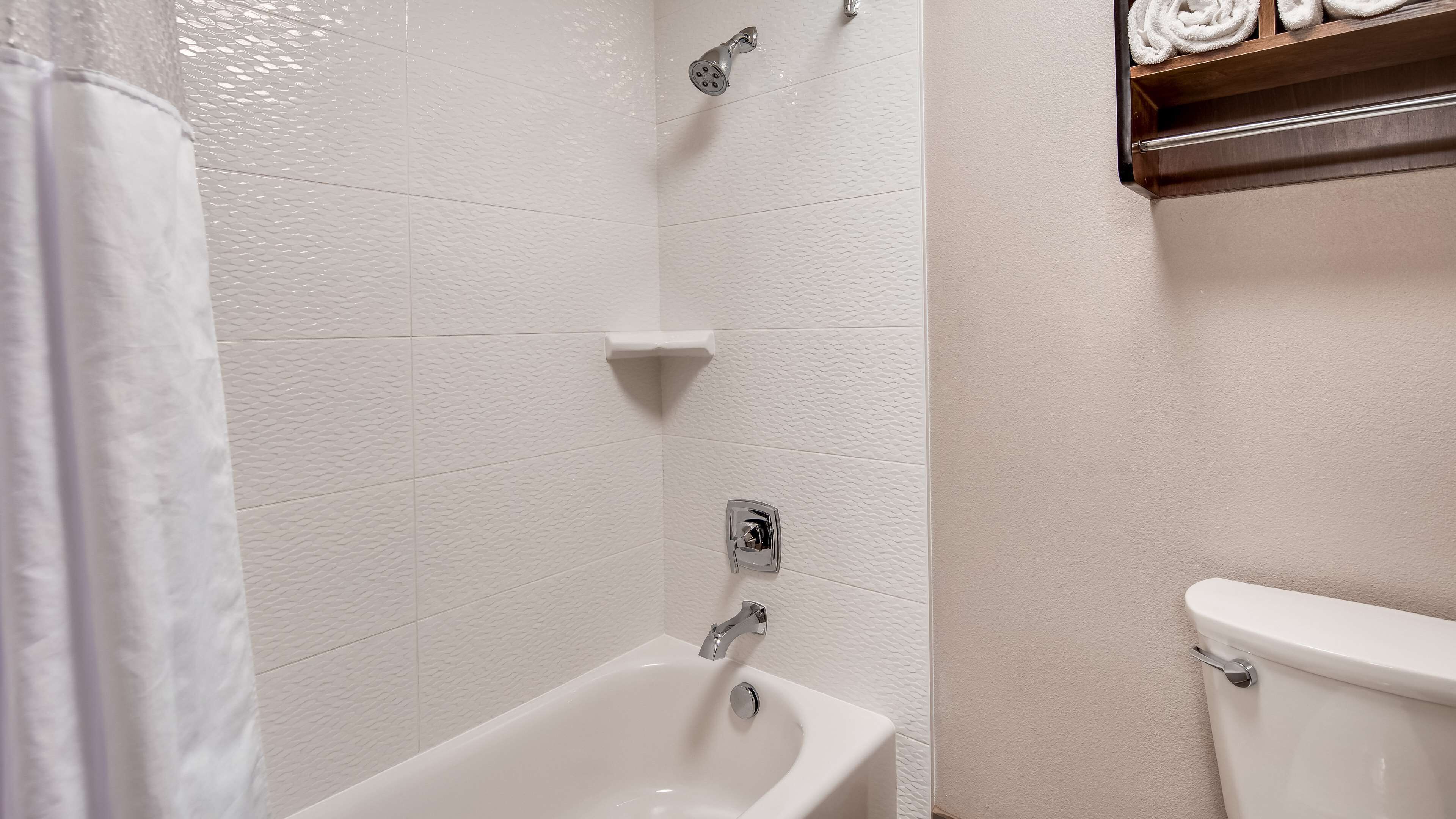 standard room, 2 queen beds, non smoking, refrigerator & microwave (with sofabed) | bathroom | combined shower/bathtub, eco-friendly toiletries, hair dryer, towels