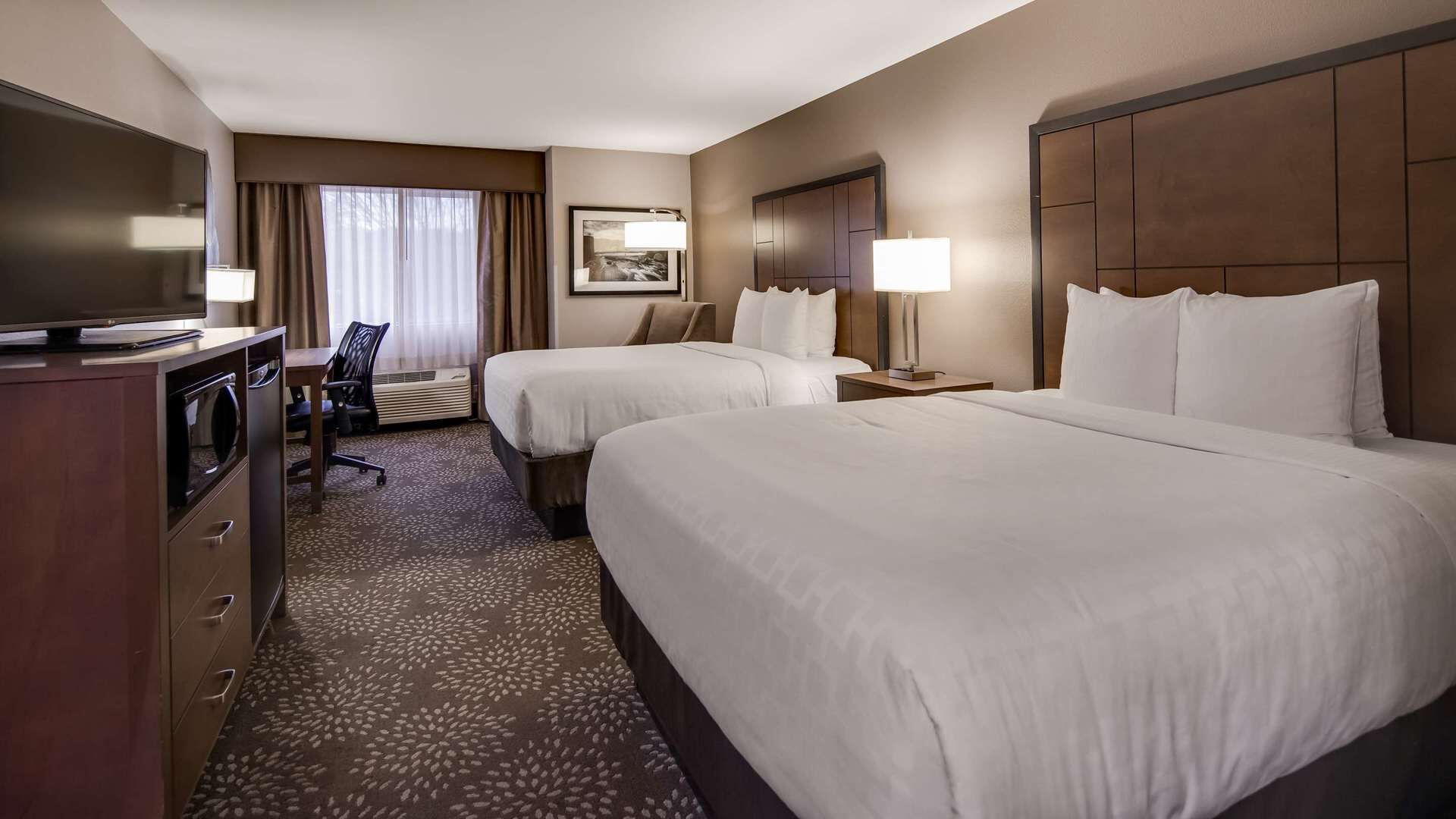 Premium bedding, down comforters, desk, laptop workspace