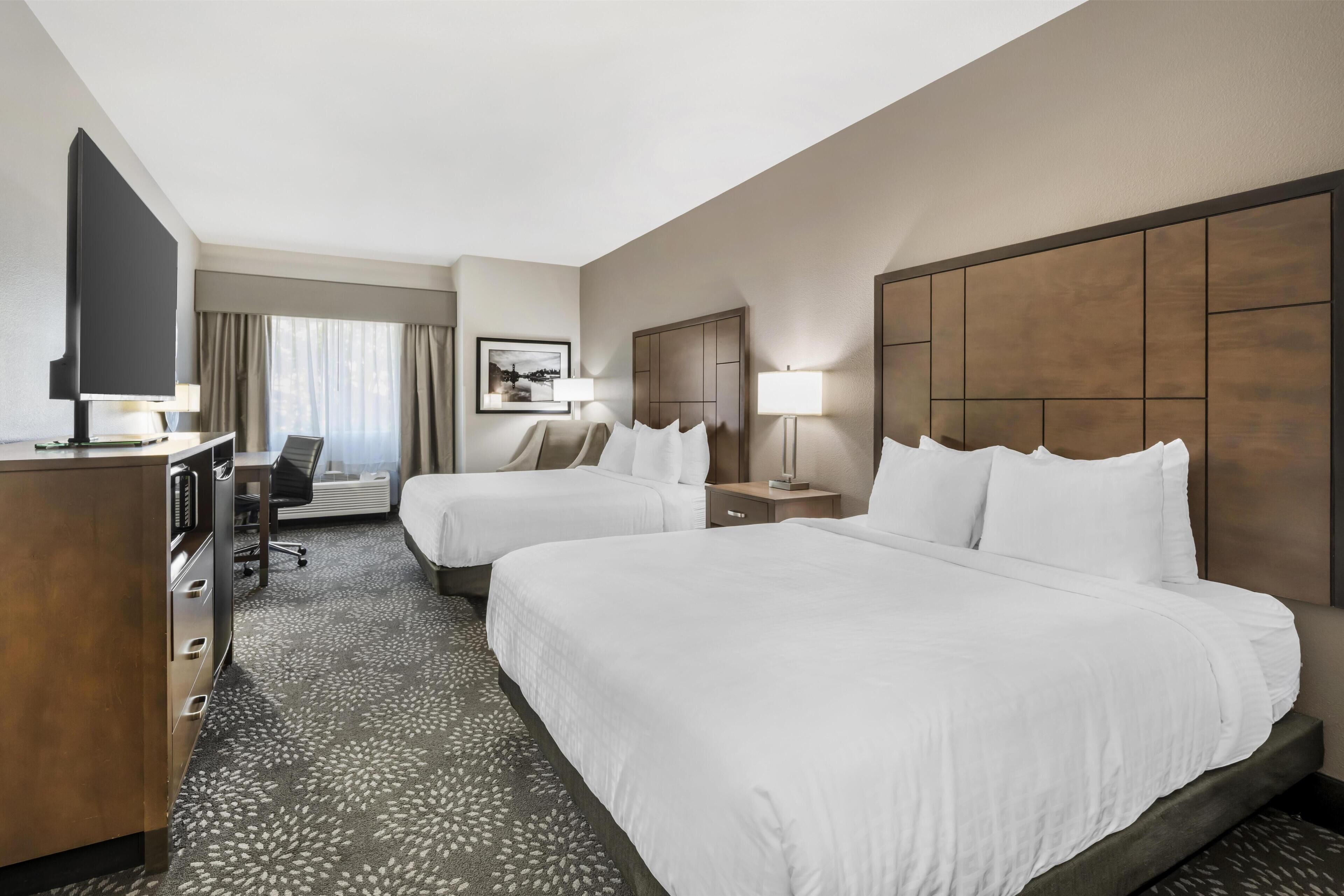 Premium bedding, down duvets, desk, laptop workspace