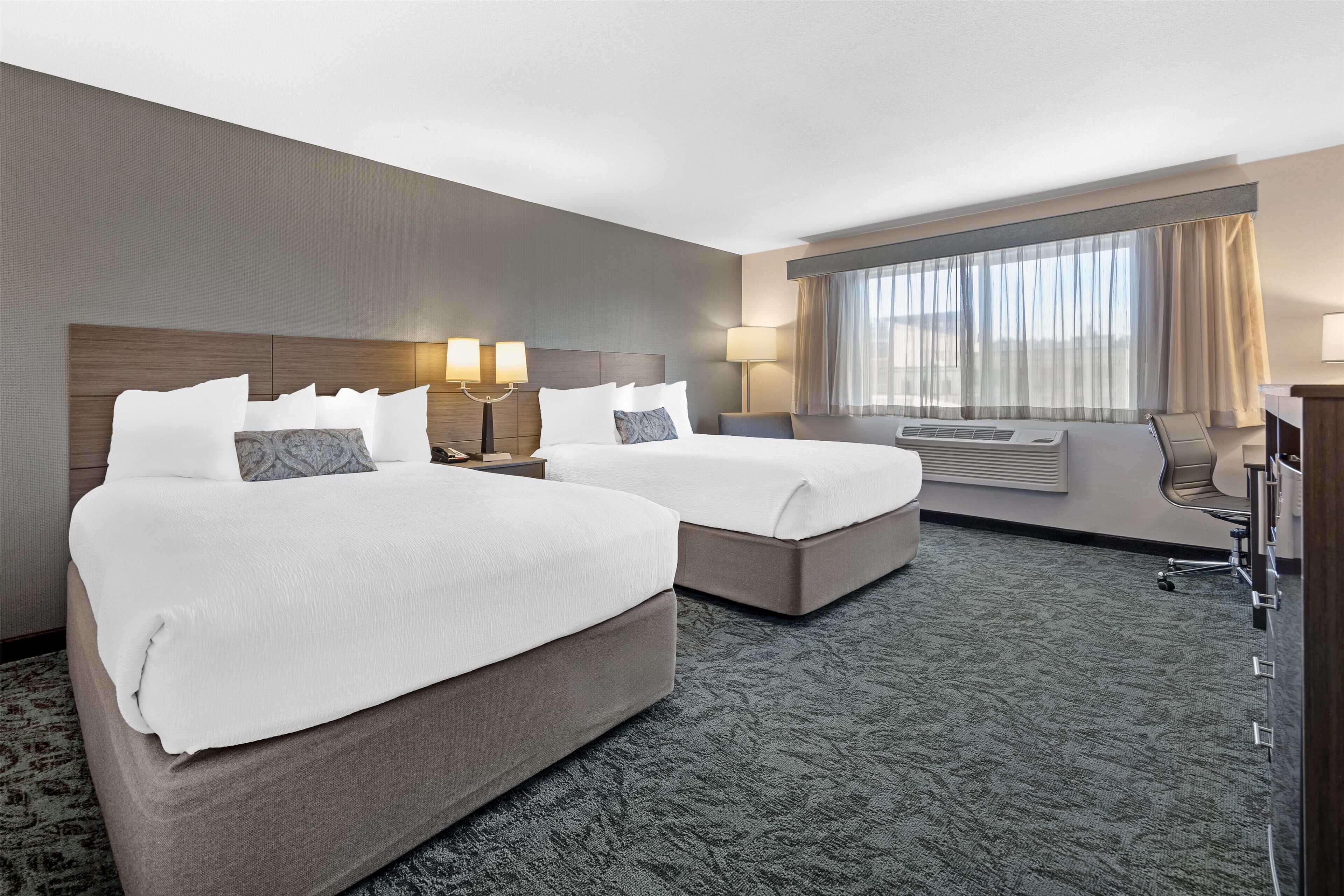 standard room, 2 queen beds, non smoking, refrigerator & microwave | premium bedding, in-room safe, individually decorated