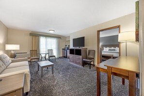 Roba de llit d'alta qualitat i caixa forta a l'habitació 