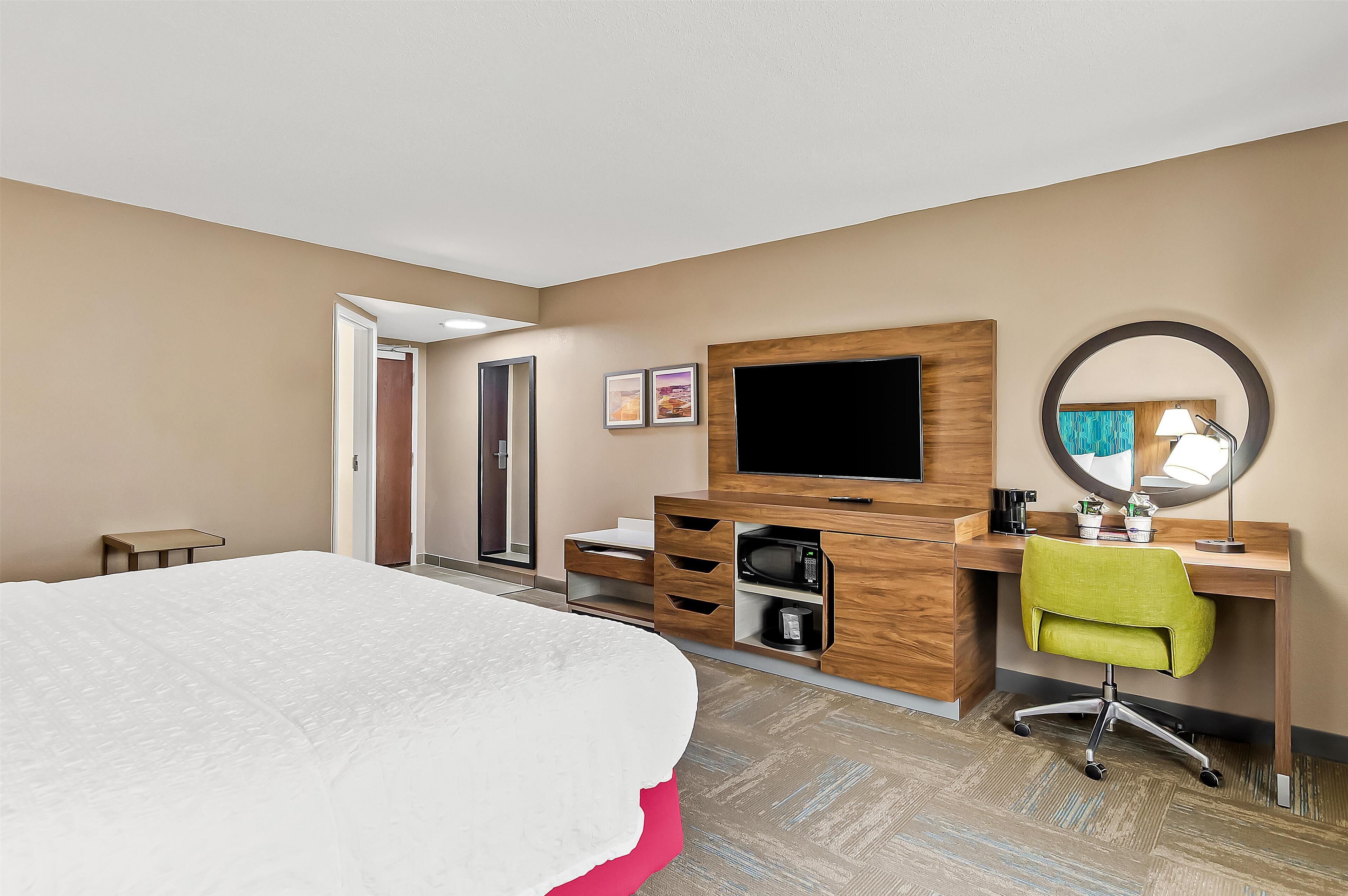 premium bedding, desk, laptop workspace, blackout curtains