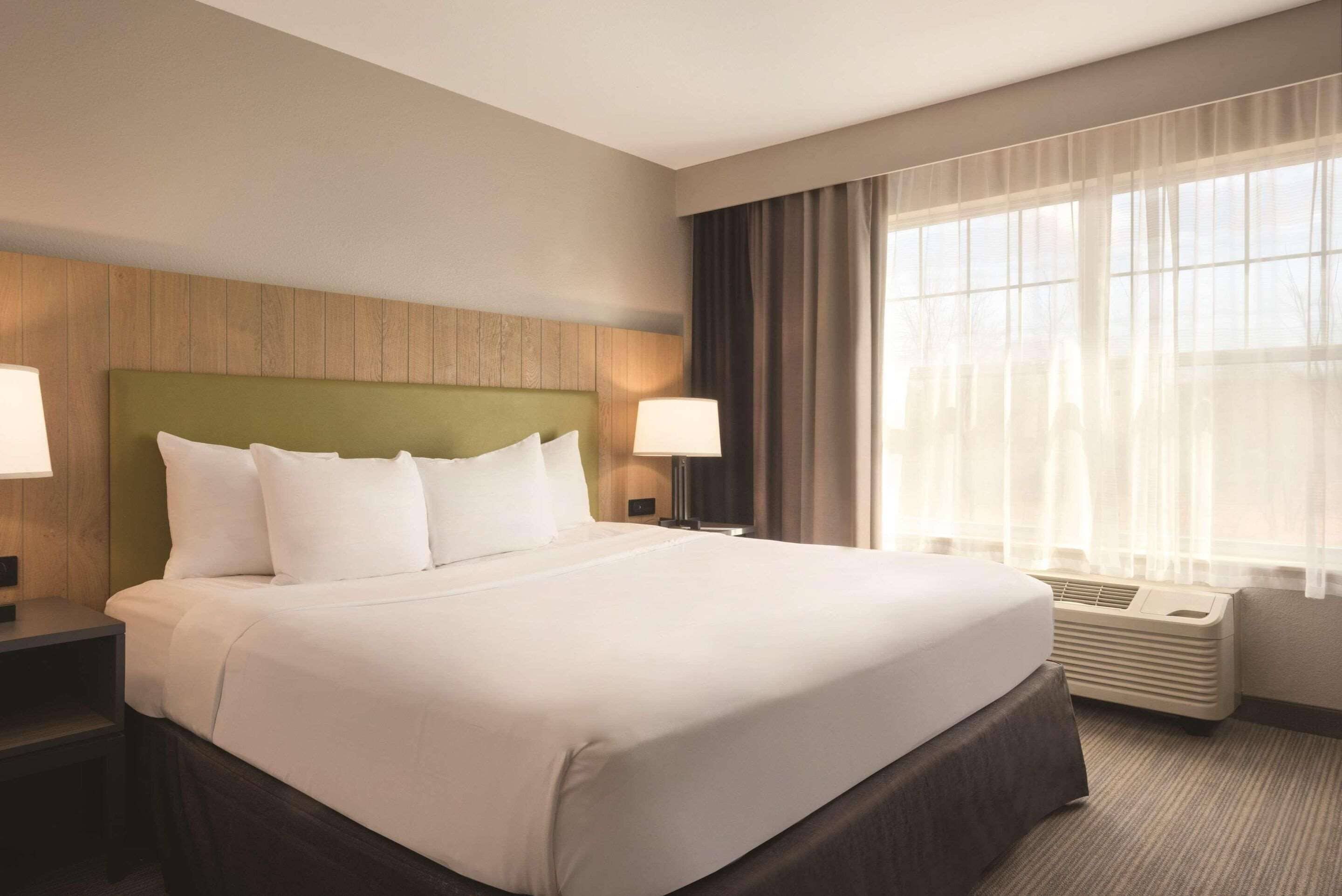 suite, 1 bedroom, non smoking | desk, laptop workspace, blackout curtains, iron/ironing board