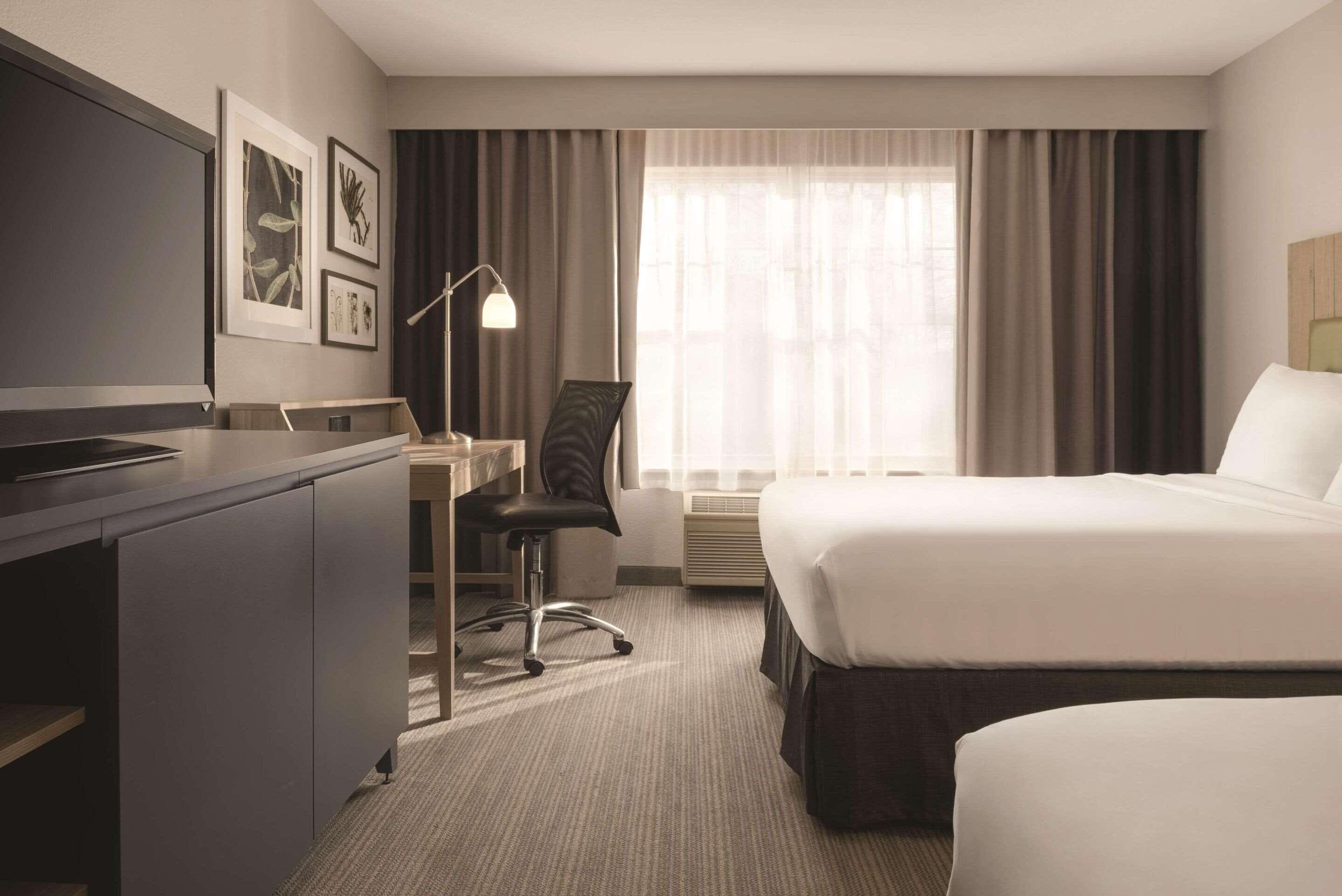 desk, laptop workspace, blackout curtains, iron/ironing board