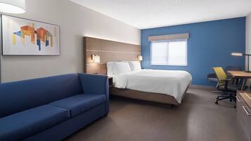 Habitación estándar, 1 cama King size y sofá cama | Ropa de cama de alta calidad y caja de seguridad en la habitación