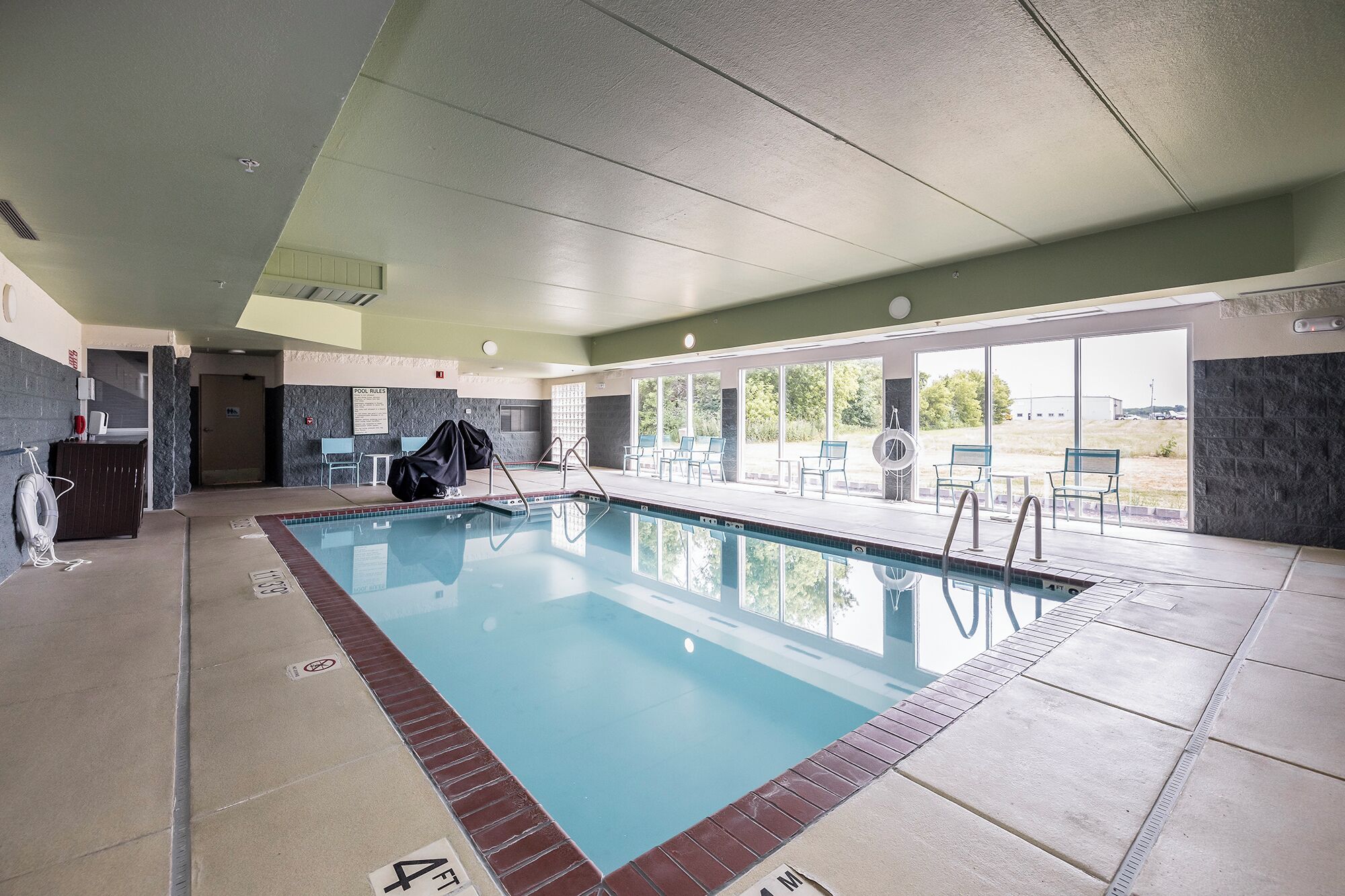 indoor pool, open 8 am to 10 pm, pool loungers