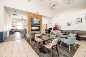 Relax in our spacious lobby with a seating area, flat-screen TV, and coffee station.