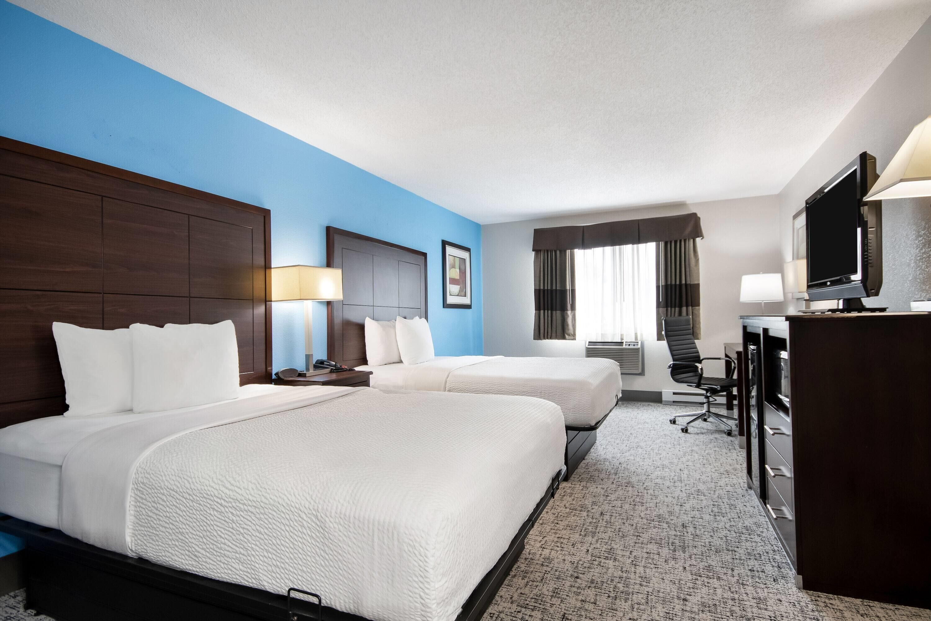 Room, 2 Double Beds, Non Smoking | In-room safe, desk, iron/ironing board, free cribs/infant beds