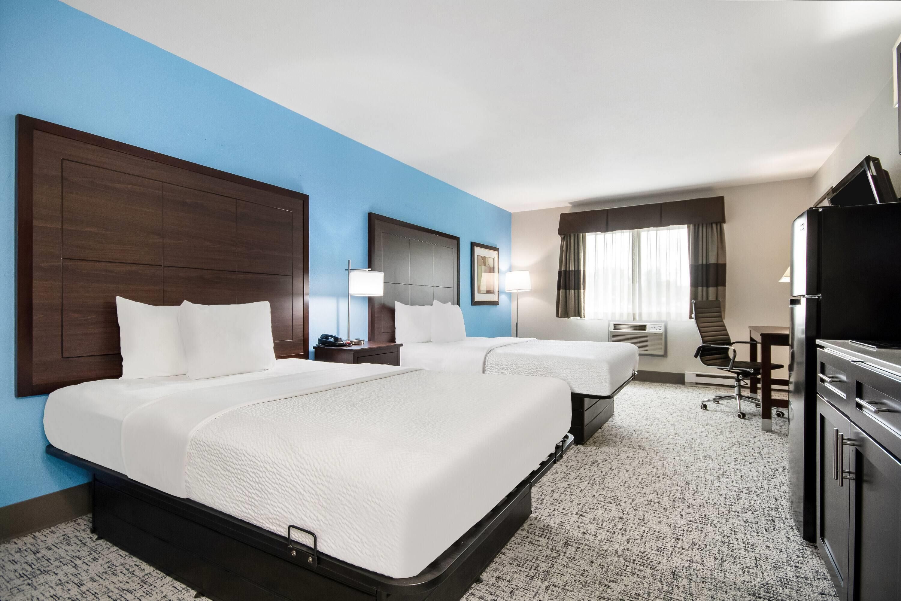 Room, 2 Double Beds, Non Smoking, Kitchen | In-room safe, desk, iron/ironing board, free cribs/infant beds