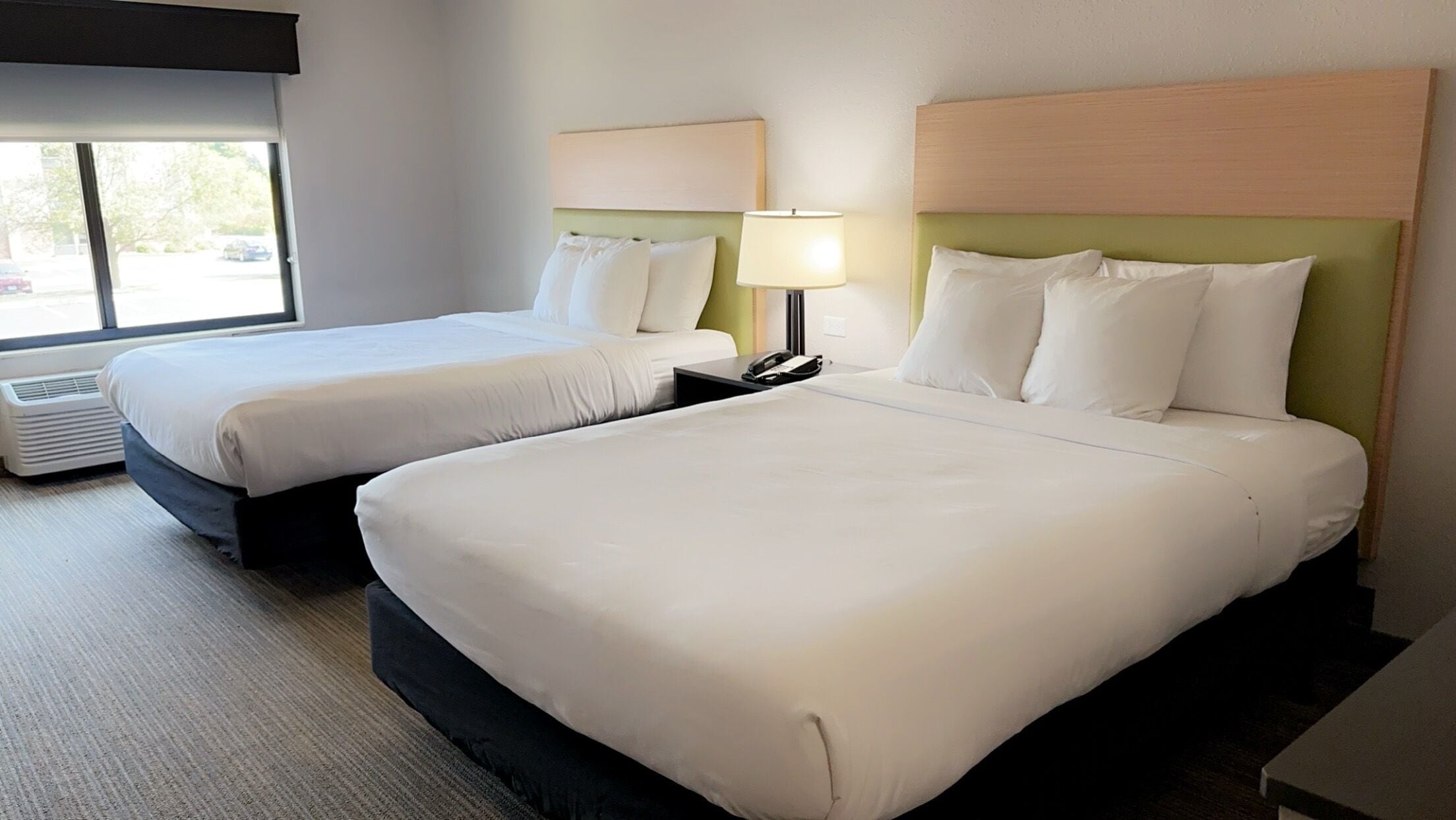 hypo-allergenic bedding, down duvets, desk, blackout curtains