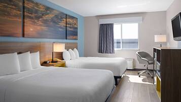 Desk, laptop workspace, iron/ironing board, free cots/infant beds