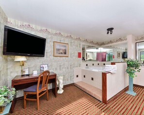 Room, 1 King Bed, Non Smoking, Jetted Tub | In-room safe, desk, laptop workspace, iron/ironing board