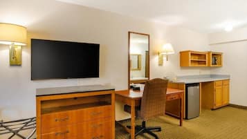 Premium bedding, desk, laptop workspace, blackout curtains