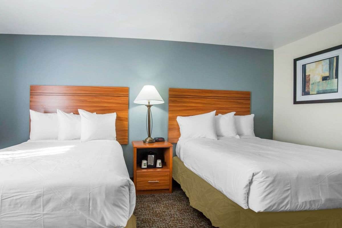 standard room, 2 double beds, non smoking | desk, blackout curtains, iron/ironing board, free cots/infant beds