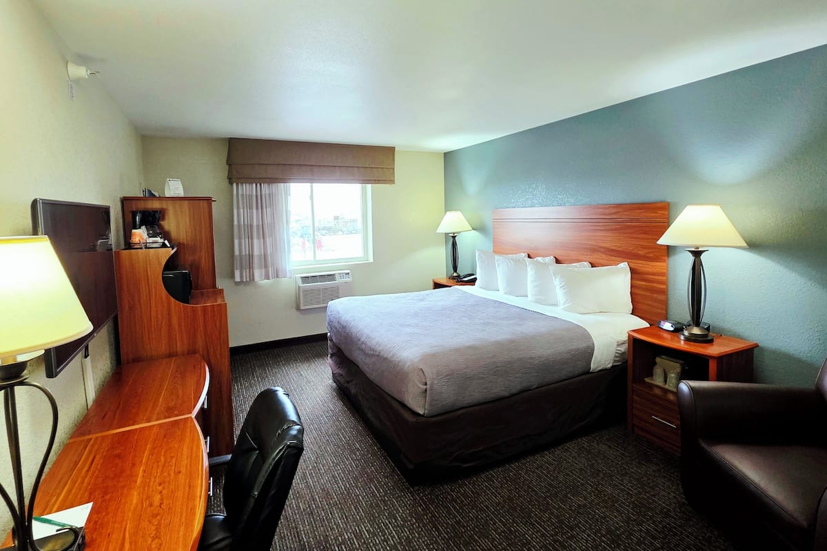 Desk, blackout drapes, iron/ironing board, free cribs/infant beds