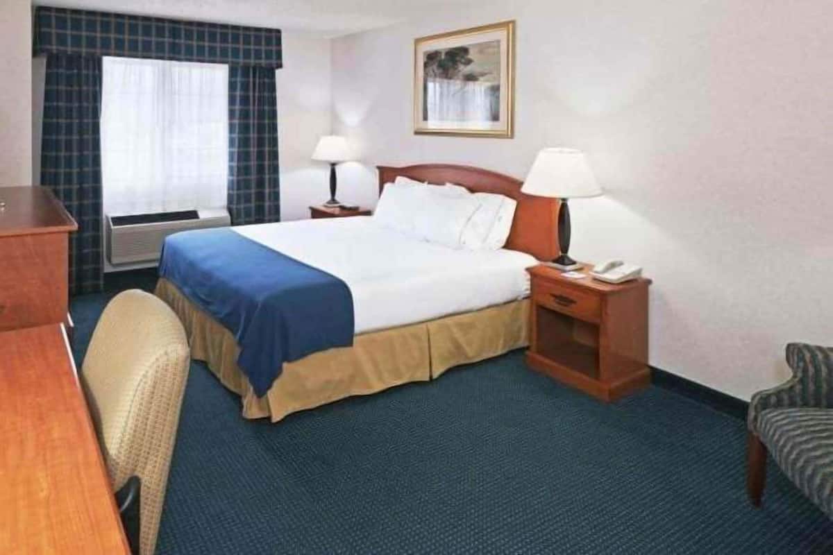 Desk, laptop workspace, blackout curtains, iron/ironing board