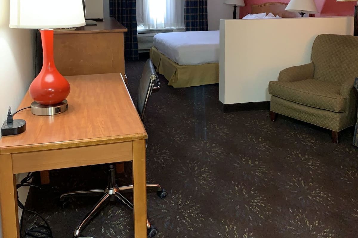 Desk, laptop workspace, blackout curtains, iron/ironing board