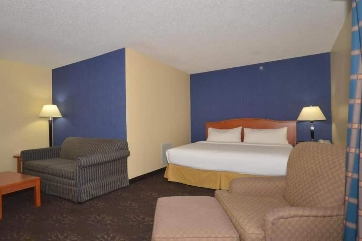 Desk, laptop workspace, blackout curtains, iron/ironing board