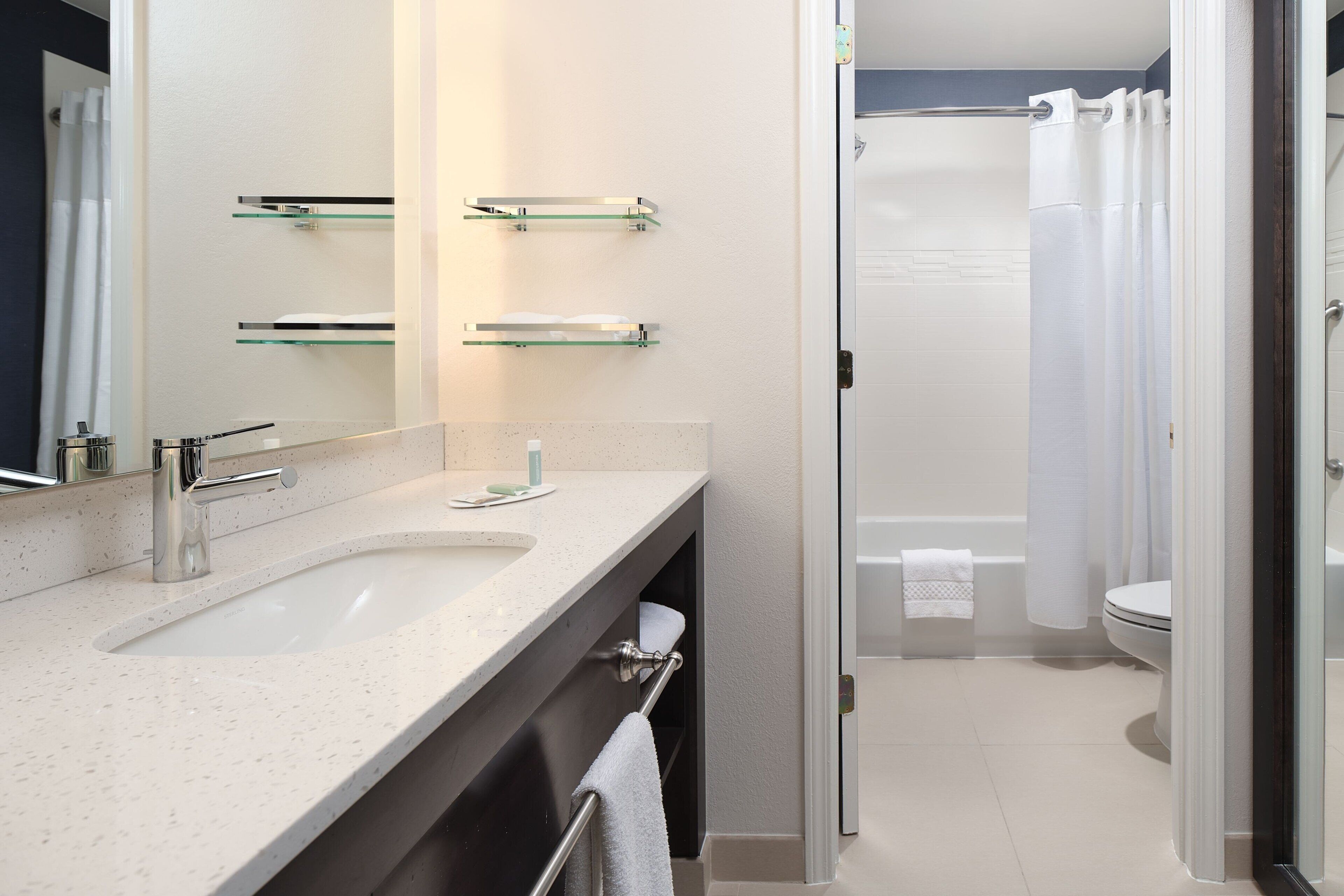 combined shower/bathtub, free toiletries, hair dryer, towels