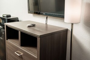 Desk, laptop workspace, blackout drapes, iron/ironing board