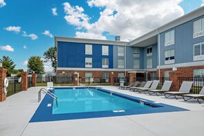 Seasonal outdoor pool, open 9:00 AM to 10:00 PM, sun loungers