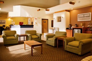 Relax in our stylish lobby with a reception desk, seating area, and kitchenette.