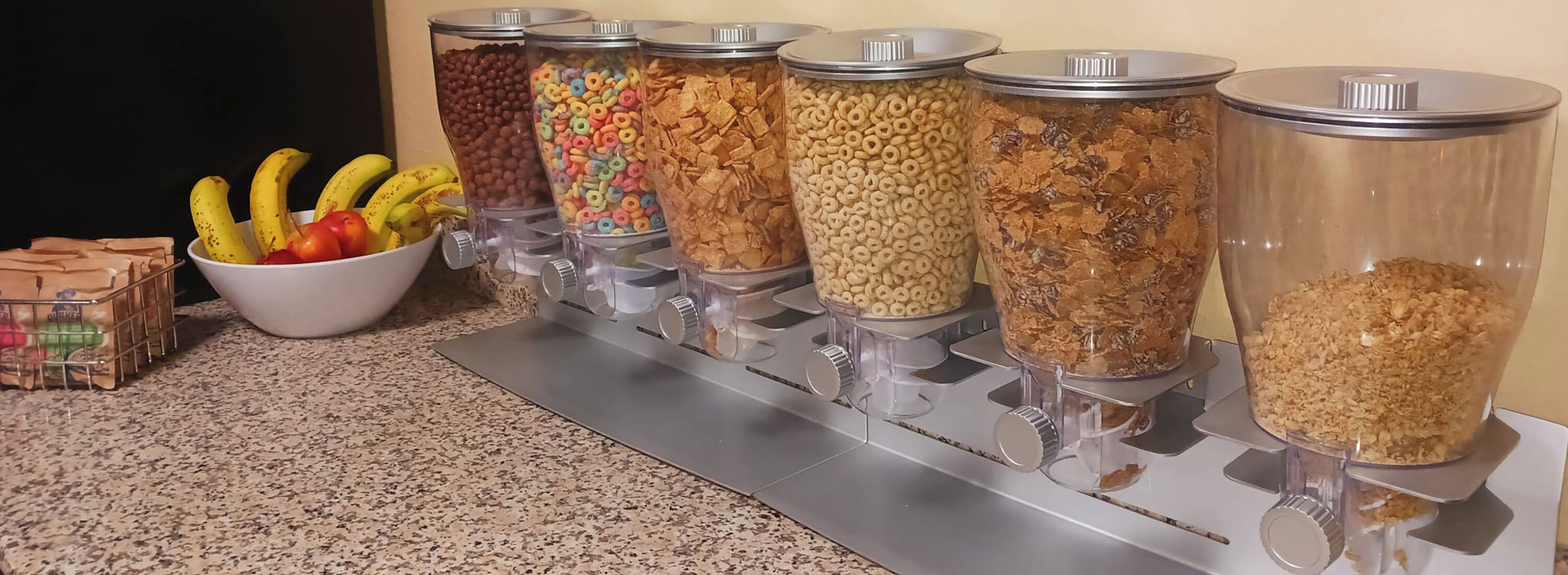 A food dispensary with various cereals and snacks.