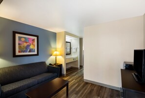 Suite, 1 King Bed with Sofa bed, Non Smoking (2 Person Sofa Bed) | Living area | 32-inch TV with digital channels, MP3 dock
