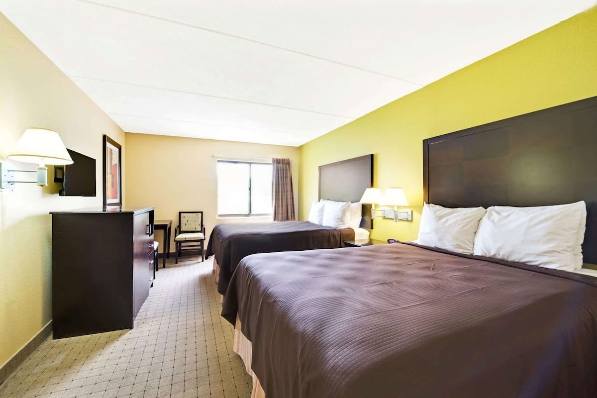 Desk, blackout curtains, free cots/infant beds, free WiFi
