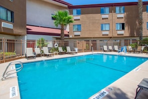 Seasonal outdoor pool, pool umbrellas, pool loungers