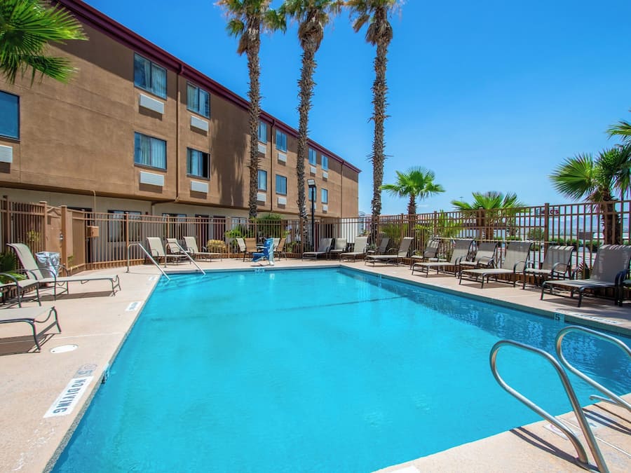 Seasonal outdoor pool, pool umbrellas, pool loungers