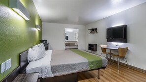 Desk, blackout curtains, bed sheets
