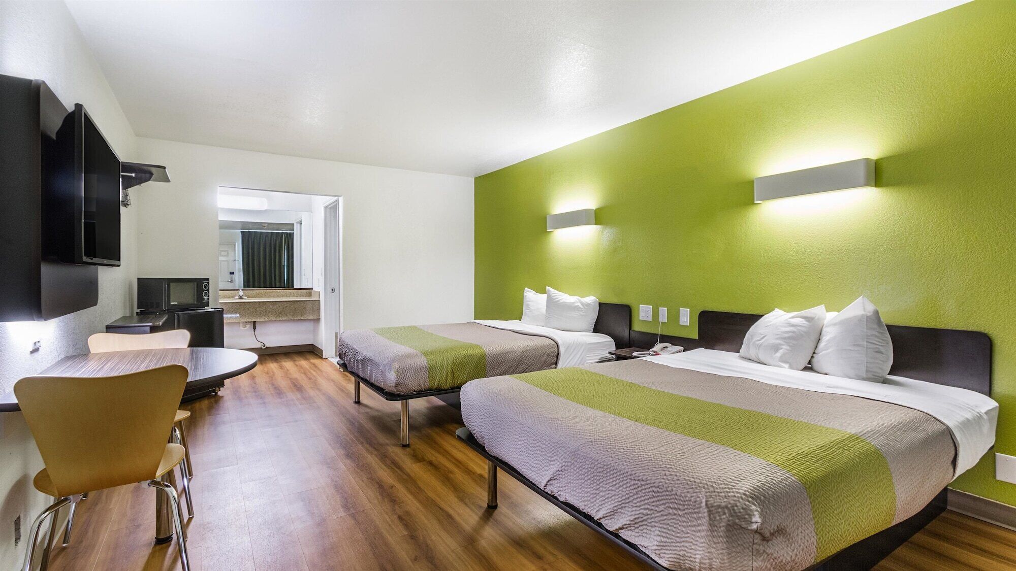 Desk, blackout drapes, bed sheets