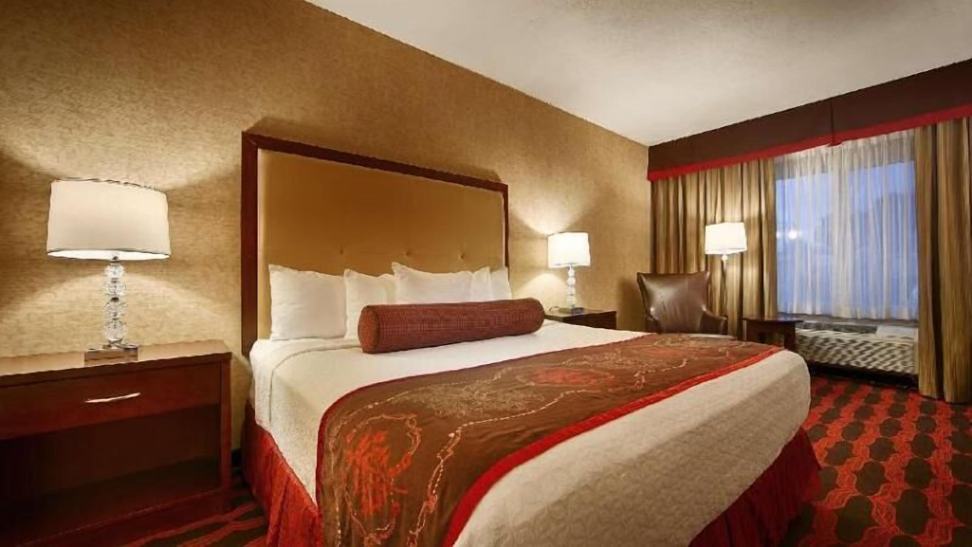 Luxe beddengoed, pillowtop-bedden, een kluis op de kamer, een bureau