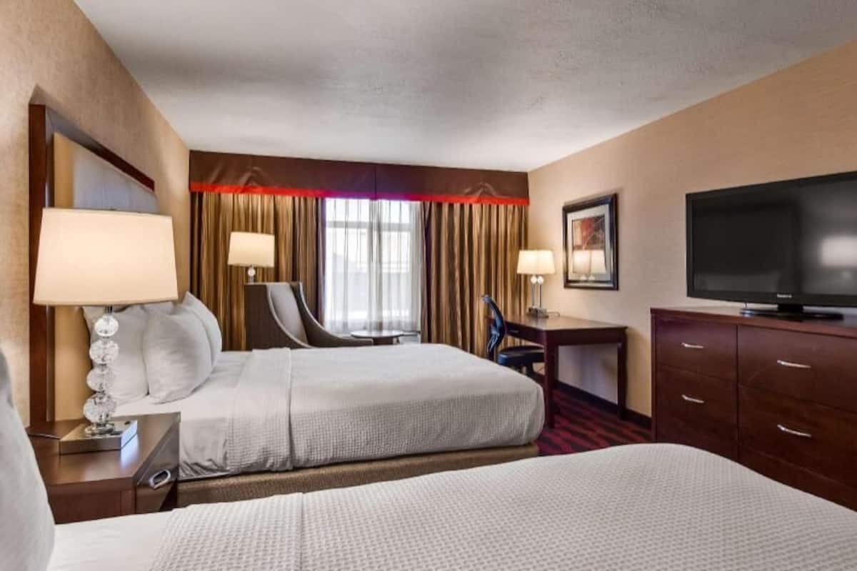 Premium bedding, pillow-top beds, in-room safe, desk