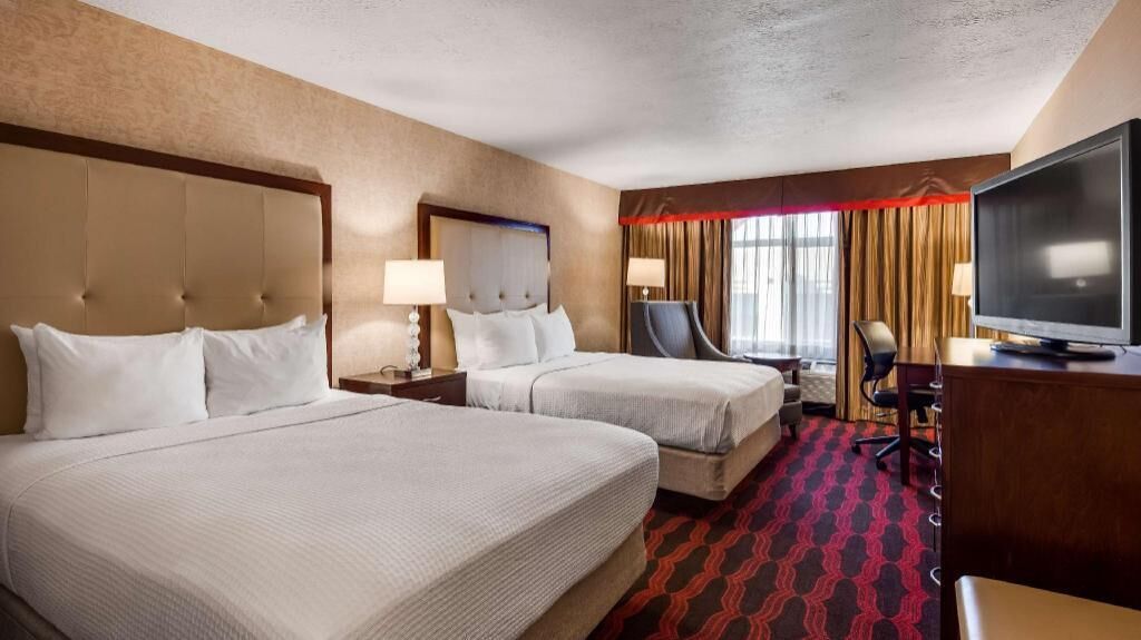 Luxe beddengoed, pillowtop-bedden, een kluis op de kamer, een bureau