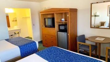 Standard Room, 2 Queen Beds | Living area | 43-inch TV with cable channels