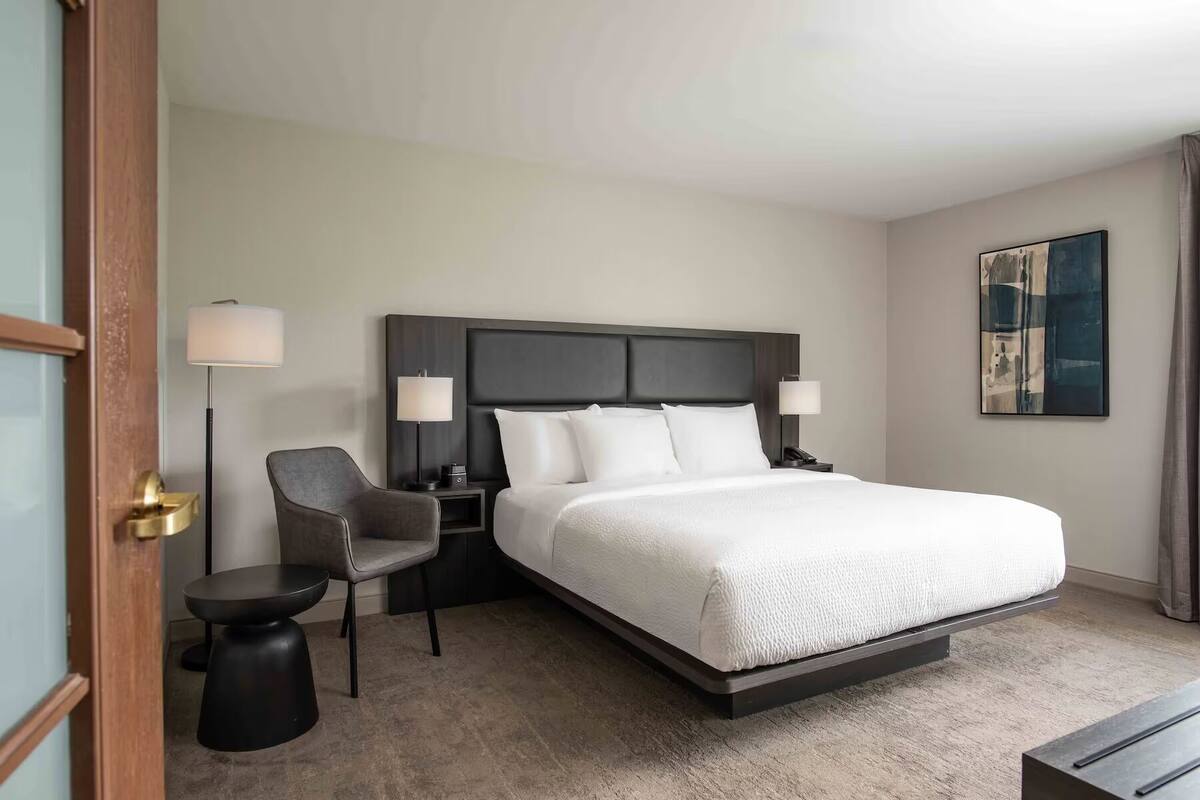Premium bedding, desk, blackout drapes, iron/ironing board