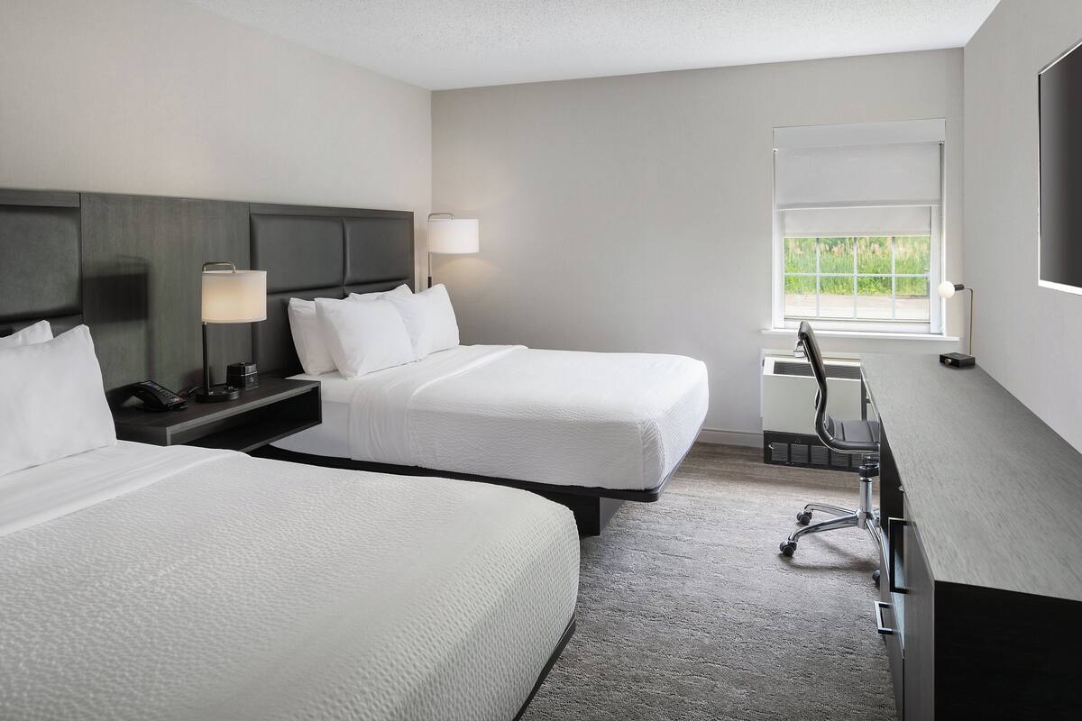 Premium bedding, desk, blackout drapes, iron/ironing board