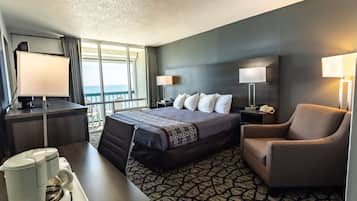 Habitación, 1 cama King size, balcón, vista al océano | Caja de seguridad en la habitación y escritorio