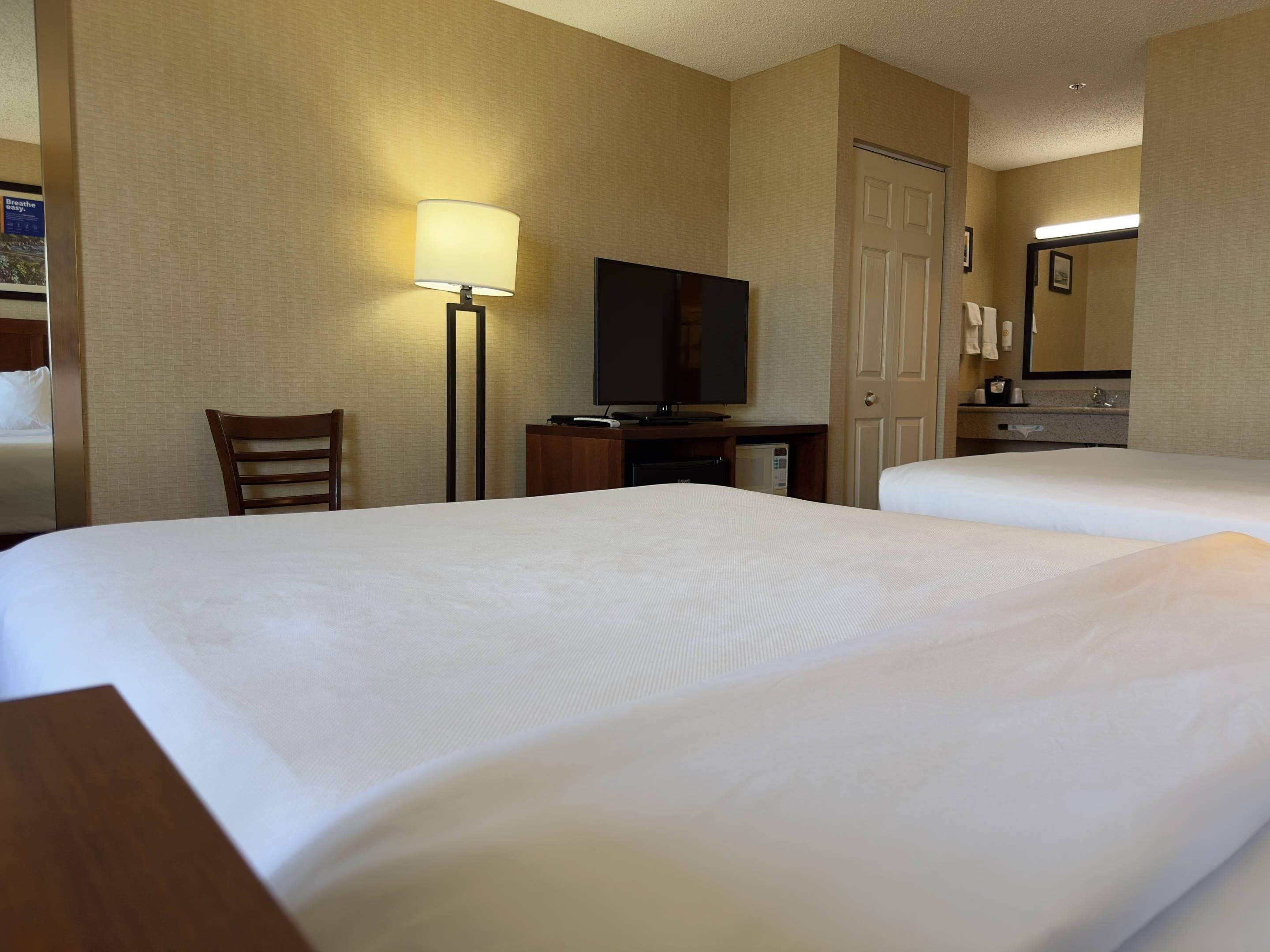 Premium bedding, desk, blackout drapes, iron/ironing board
