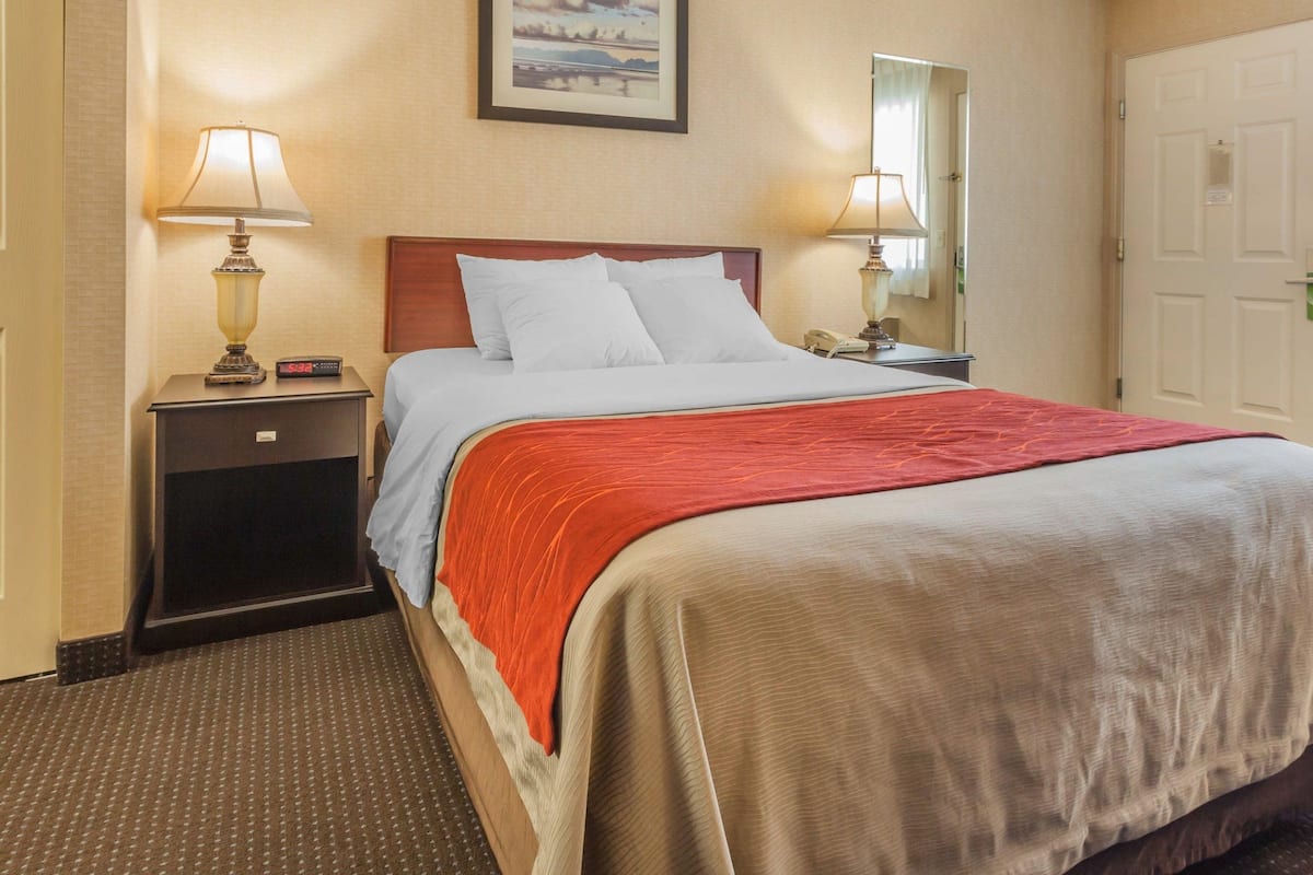 Premium bedding, desk, blackout drapes, iron/ironing board