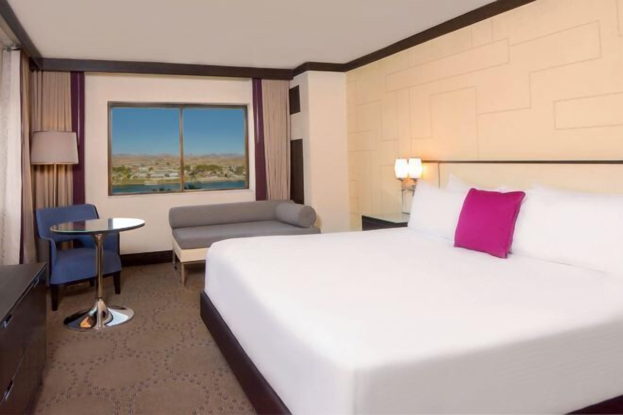 Hypo-allergenic bedding, pillowtop beds, desk, laptop workspace