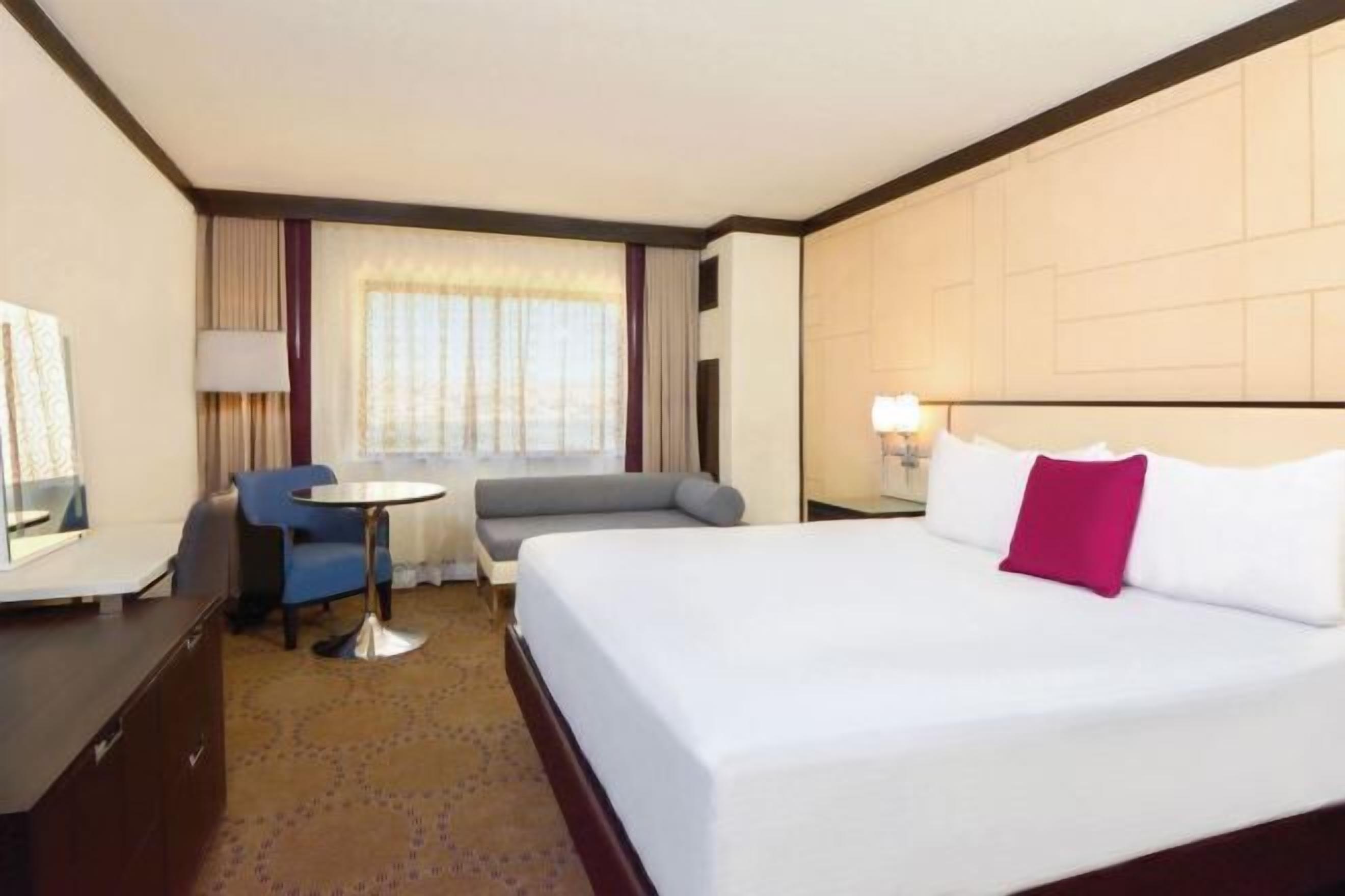 Hypo-allergenic bedding, pillowtop beds, desk, laptop workspace